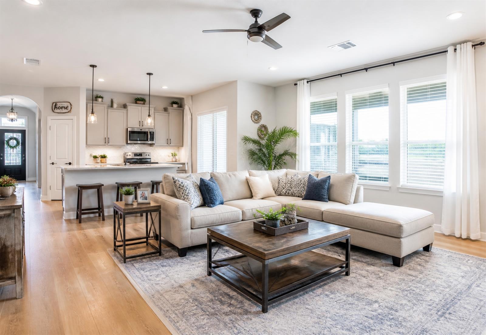 Bright, freshly cleaned living room and kitchen in a San Antonio home